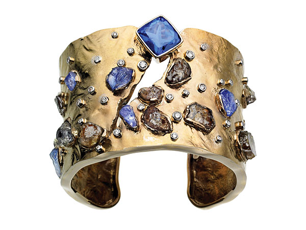 A stunning design from Ginny Dizon, incorporating natural brown and faceted blue tanzanite. 